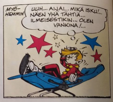 Sarjakuvan ruutu. Piko pitelee päätään lepotuolilla ja näkee tähtiä. Ajatuskuplassa lukee Uuh, aijai, mikä isku. Näen yhä tähtiä. Ilmeisestikin... olen vankina,